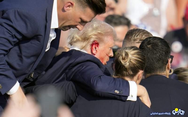 تصویرسازی لحظه اصابت تیر به گوش ترامپ تصویرسازی لحظه اصابت تیر به گوش ترامپ